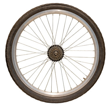 Bicycle wheel with rear sprocket on an isolated background.