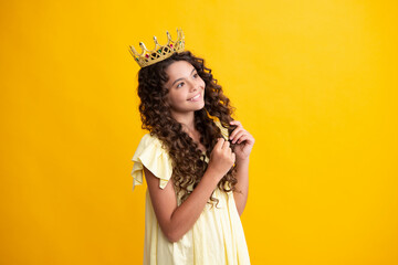 Beauty teen girl queen wear crown. Child in princess diadem. Happy teenager, positive and smiling...