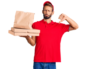 Handsome blond man with beard holding take away food with angry face, negative sign showing dislike with thumbs down, rejection concept