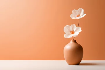 Zelfklevend Fotobehang Two white anemone flowers in a peach fuzz color vase on minimal background. Modern trendy tone hue shade © Cherstva