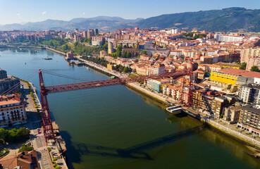 Aerial view of Vizcaya bridge over the river and cityscape at Portugalete, Spain