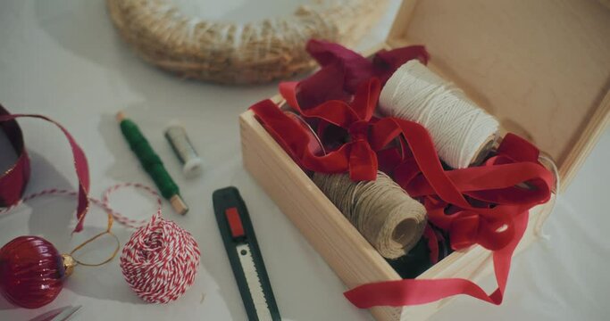 Christmas Wreath Decoration Supplies On Table