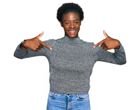 Young african american girl wearing casual clothes looking confident with smile on face, pointing oneself with fingers proud and happy.