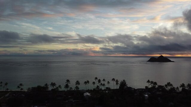 Shortened Clip of Sunrise Flight out to Mokulua Islands and Reef from Lanikai Hills. 