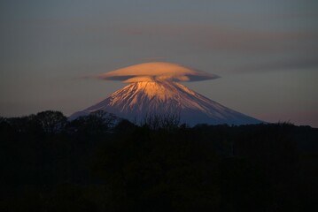 Cap cloud of Mt. Fuji. Rare image. A phenomenon that occurs when strong winds blow through humid...