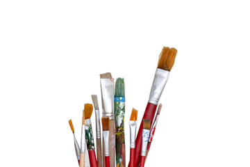 Old paintbrushes of many colors that have been used