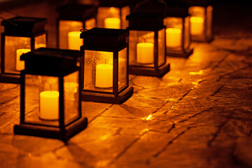 Solar lanterns light up at night.