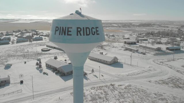 Aerial View of Pine Ridge Water Tower Overlooking Snow-Covered Reservation