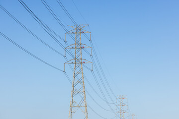 Pylon and high voltage powerline over the blue sky