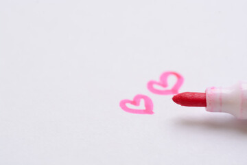 'LOVE' written in pen embodies the essence of romantic affection, evoking heartfelt emotions and...