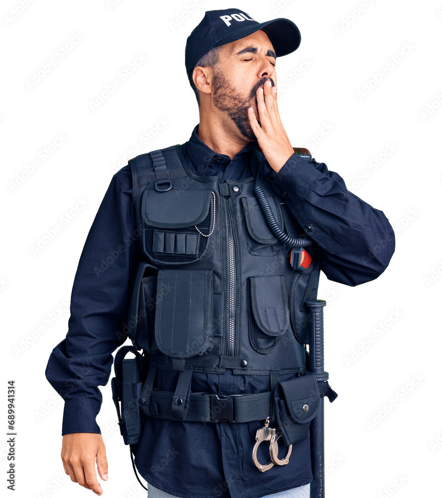 Poster Young hispanic man wearing police uniform bored yawning tired covering mouth with hand. restless and sleepiness.