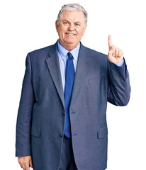 Senior grey-haired man wearing business jacket showing and pointing up with finger number one while...