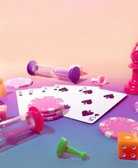 Fototapeta na wymiar Game Scene with Poker Chips, Playing Cards, Chess Pieces, Dice, Gaming Sand Timers and Board game Pawns on a Pastel Pink & Blue Background on