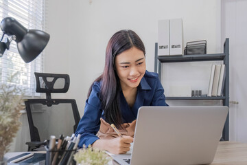 Business woman using calculator for do math finance on wooden desk in office and business working...