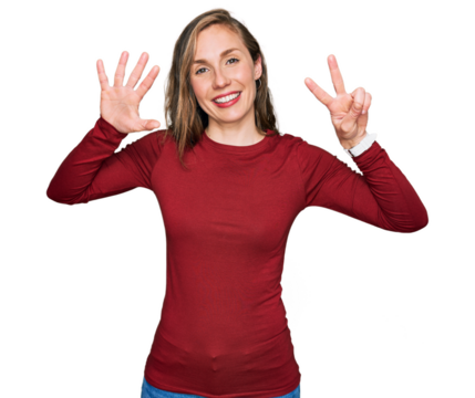 Young blonde woman wearing casual clothes showing and pointing up with fingers number seven while smiling confident and happy.