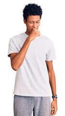 Young african american man wearing casual clothes feeling unwell and coughing as symptom for cold or bronchitis. health care concept.