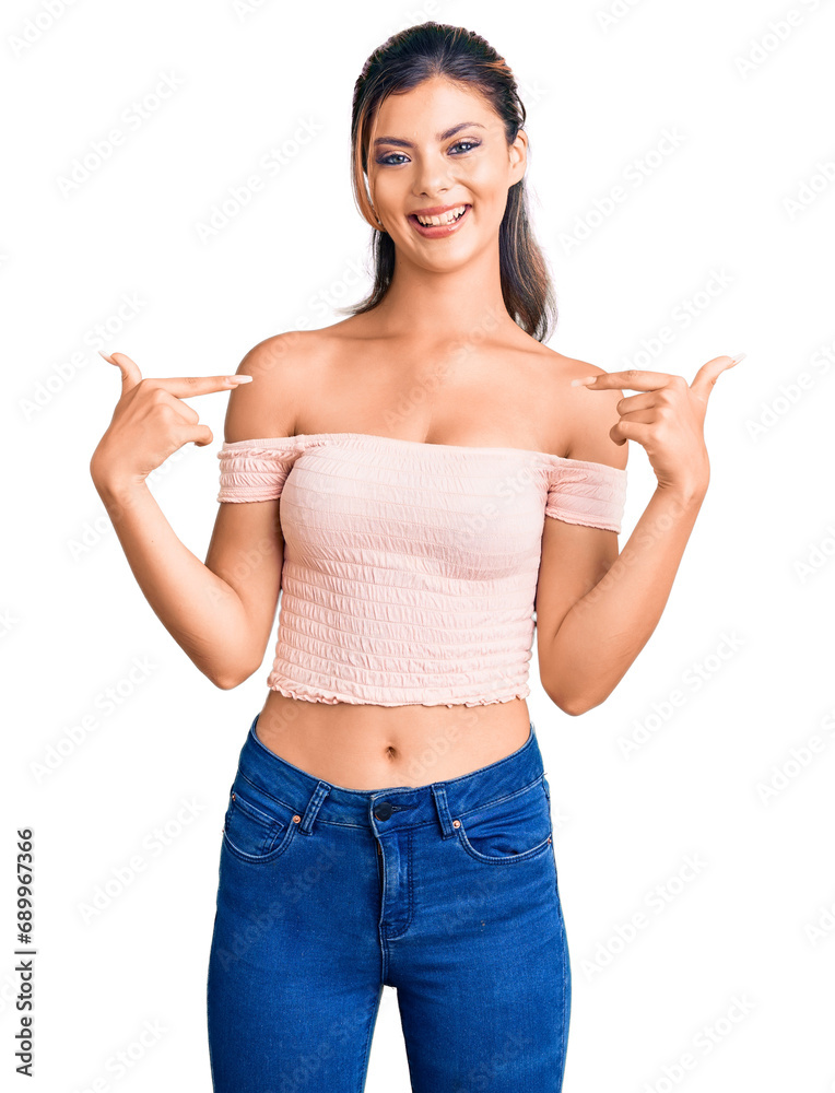 Sticker Young beautiful woman wearing casual clothes looking confident with smile on face, pointing oneself with fingers proud and happy.