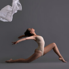 Graceful girl in beige underwear profile shot