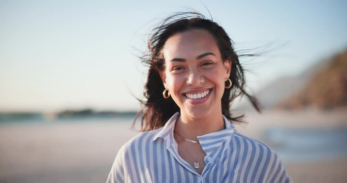 Summer, travel and face of happy woman at a beach with positive energy, attitude or mindset outdoor. Freedom, wind and portrait of female person at sea for holiday, vacation or adventure in Miami