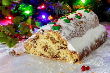 Fototapeta na wymiar Stollen is a traditional German Christmas cake made with marzipan.