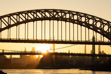 Hell Gate Bridge and RFK Bridge at sunset in NYC