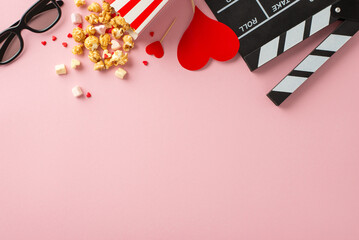 Love-filled movie magic. Top view snapshot of clapperboard, 3D glasses, striped popcorn container,...