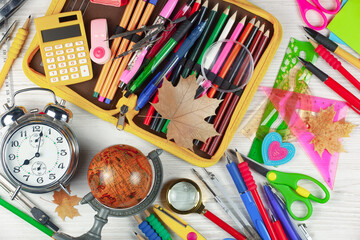 School supplies for learning. Back to school. Accessories are arranged in a composition on the table.