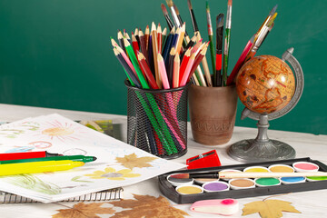 School supplies for learning. Back to school. Accessories are arranged in a composition on the table.