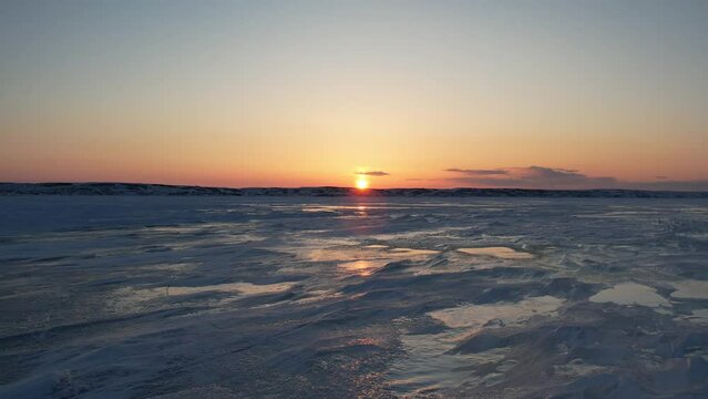 frozen river sunset