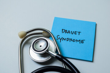 Concept of Dravet Syndrome write on sticky notes isolated on white background.