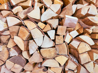 Chopped firewood as an abstract background. Texture