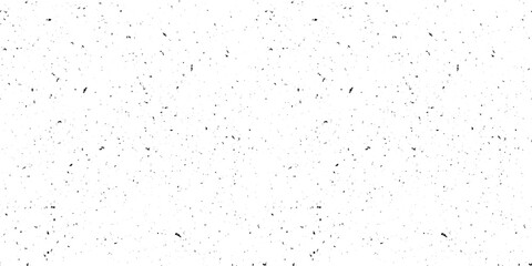 Black and white mottled seamless pattern. Small grunge sprinkles, particles, dust and spots wallpaper. Noise grain repeating background. Overlay random grit texture. Vector illustration