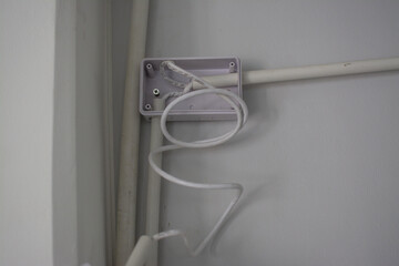 electrical junction box with white pipe connection