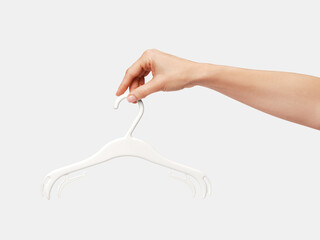 Female hand with a hanger
