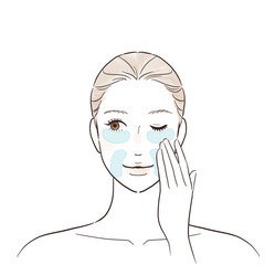 目元と口元に保湿シートを貼る女性