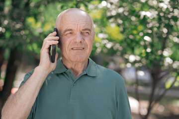 Senior person talking on cell phone.