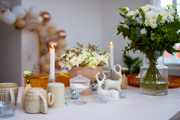 Bouquet of flowers and candles with decoration