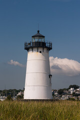 Picturesque harbor lighthouse in New England