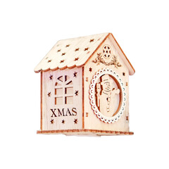 A toy on the Christmas tree in the form of a wooden house, isolated on a white background
