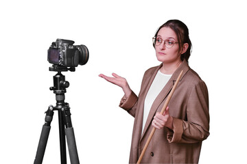 Sad woman teacher with camera on tripod leads online school on isolated on a white background, copy space