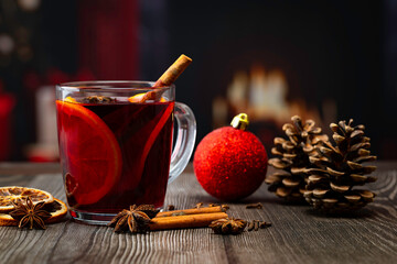 mulled wine on the background of the Christmas decoration.