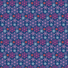 Bright seamless winter pattern with pink and scarlet snowflakes. Pattern on the swatch panel.