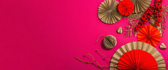 Lunar Chinese New Year concept. Oriental asian style paper fans, traditional decor, minimal concept