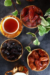 Several varieties of dates. Beautiful dishes with dates. Oriental sweetness. Top view.