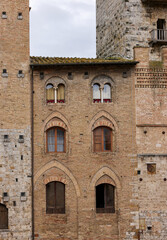 Fototapeta na wymiar Palazzo Vecchio del Podesta at Piazza del Duomo in San Gimignano. Tuscany. Italy