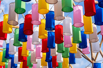 Decorated colorful lanterns hanging on a stand in the streets in Chiang Mai City, Thailand during...