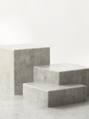 Three modern cuboid polished cement podium, geometric pedestal on gray counter. Luxury cosmetic,...