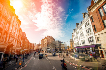 London city street view with sunray effect - obrazy, fototapety, plakaty