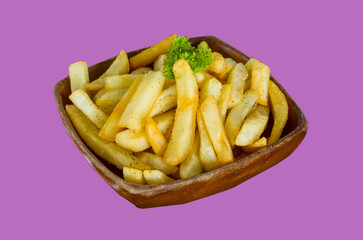 French fries in wood bowl on pink background