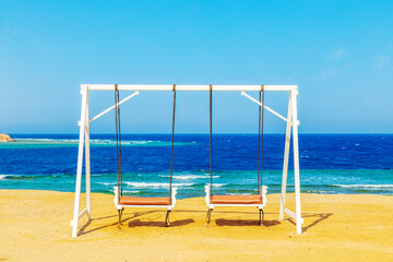 Swing on the shore of the Red Sea.